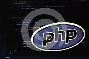 Moscow, Russia - 1 June 2020: PHP logo sign with program code on background Illustrative Editorial