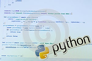 Moscow, Russia - 1 June 2020: Python logo sign with program code on background Illustrative Editorial