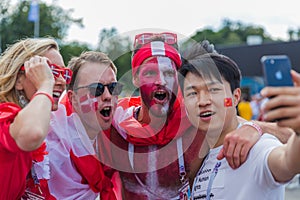 Moscow, Russia - June 26, 2018: Soccer fans on Moscow street during the 2018 Football World Cup in Russia.