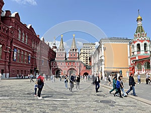 Moscow, Russia, June, 02, 2023. Tourists on Red Square in front of the Resurrection Gate of the Moscow Kremlin