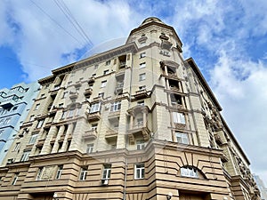 Moscow, Russia, March, 10, 2024. Malaya Sukharevskaya Square, 3. residential building with a polyclinic
