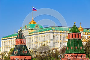 Moscow, Russia - May 01, 2019: Building of Grand Kremlin Palace with waving flag of Russian Federation on the roof against Moscow