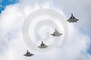 Moscow, Russia - May, 05, 2021: Four Sukhoi SU-57 flying over Red Square during the preparation of the May 9 parade