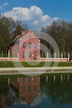 Moscow, Russia - May 17, 2021: pond and The Dutch House in Kuskovo was the summer country house and estate of the