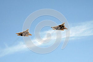 Russian multi-purpose fighters of the fifth generation of Su-57 during the military parade, fly in the sky over Red Square.