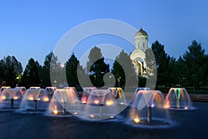 Colorful Fountains and Church of St. George in Twilight - Victor