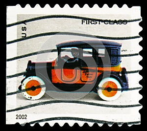 Postage stamp printed in United States shows Toy Taxicab - First Class,Toy Vehicles serie, circa 2002