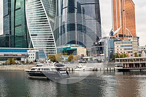 MOSCOW, RUSSIA - OCTOBER 24, 2017: Modern business class pleasure boats next to the wharf of Moscow International Business Centre.