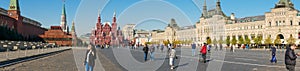 Moscow, Russia - October 5, 2021: Panoramic view of Red Square. People walk near the Kremlin, Lenin`s mausoleum, the building of