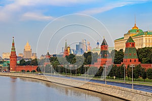 Moscow, Russia - September 02, 2018: Moscow Kremlin and Kremlevskaya embankment at sunny morning against blue sky