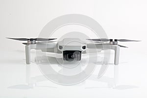 Dji mavic mini drone on white table