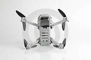 Dji mavic mini drone on white table