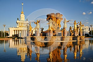 Gilded Statutes of Soviet Republics at Sunset