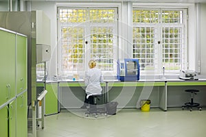 Woman works in laboratory of Forensic criminal photo
