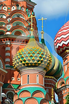 Moscow St. Basil`s Cathedral on a bright Sunny day against a blue sky