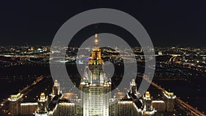 Moscow State University and Illuminated Moscow Skyline at Night. Russia. Aerial View