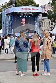Moscow Transport Day-2019. Singer woman on stage plays guitaar
