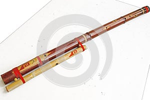 MoseÃ±o, traditional Andean bass wind instrument made with red colored bamboo.