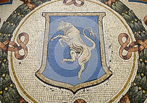 Mosiac of the Bull of Turin in the center of the Galleria Vittorio Emanuele II in Milan, Italy`s oldest shopping mall.