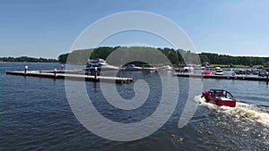 Moskow, Russia - MAY 15, 2018 amphibious vehicle , WaterCar Panther , Red Car , swimming on the river by car