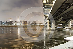 Moskva River, Luzhnetskaya Bridge Metro Bridge on a winter evening. Moscow, Russia