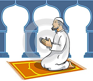 Moslem men sit and pray photo
