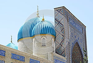 Mosque  with beautiful turquoise domes on minarets. photo