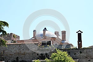 Mosque behind wall