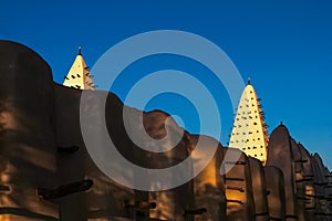 Mosque of Bobo-Dioulasso building exterior at sunset, landmark of Burkina Faso, West Africa photo