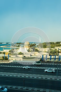 Mosque with burj al arab hotel in the background, Dubai