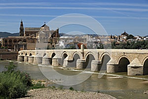 Mosque Cathedral (Spanish: La Mezquita) and Roman Bridge on Guadalquivir river in Cordoba, Spain, Andalusia region.