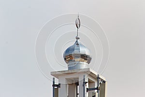 mosque dome tower with speaker for call to prayer