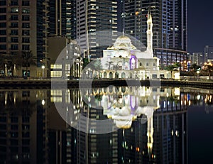 Mosque in Dubai Marina Promenade at night, UAE
