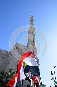 Mosque leader Ibrahim demonstrators carrying flags