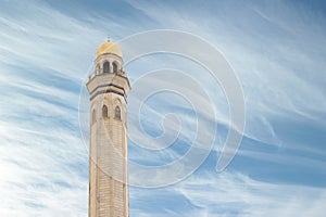 Mosque, minarets against a beautiful blue sky on a sunny day