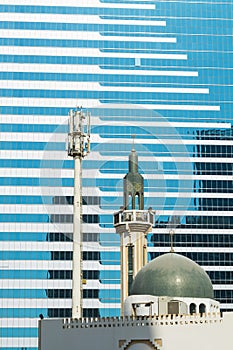 Mosque and modern building Abu Dhabi