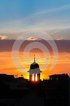 Mosque silhouette with beautiful sunset background.mosque is more than a place of worship, study and discuss Islam,community