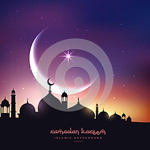 Mosque silhouette in night sky with crescent moon and star photo