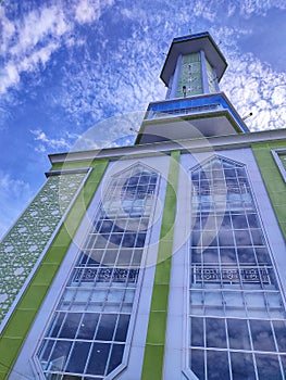 Mosque tower against the sky. Where the call to prayer echoed and also used for wide-viewing