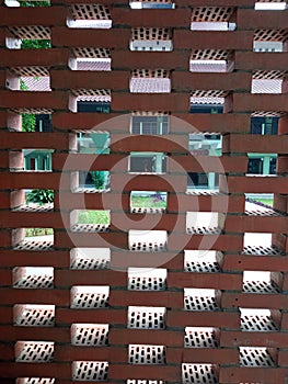 Mosque walls on campus with perforated brick pattern