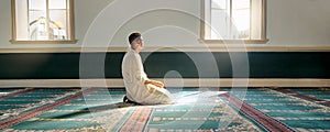 Mosque, worship and muslim man in prayer on his knees for gratitude, support or ramadan for spiritual wellness. Religion