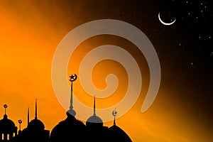 Mosques Dome and Crescent Moon star with shadow on twilight gradient black and gold ackground. for eid al-fitr, arabic, Eid al- photo