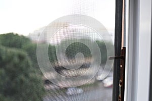 Mosquito net on a PVC window