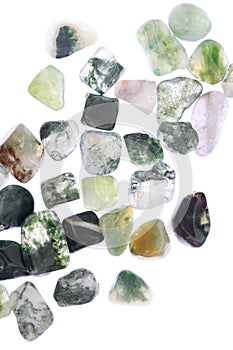 Moss agate heap up stones texture on white light isolated background