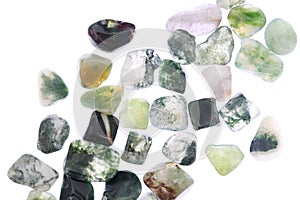 Moss agate heap up stones texture on white light isolated background