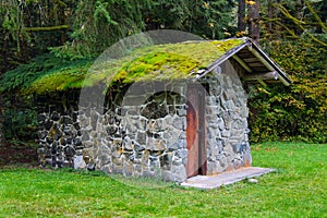 Moss-Covered Stone Well House