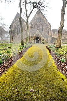 Mossy Green Path to St Paul`s Church in Jarrow in the Mist