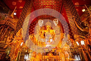 Most beautiful group of Thai golden buddha statue at Wat Phra That Hariphunchai Buddhist temple