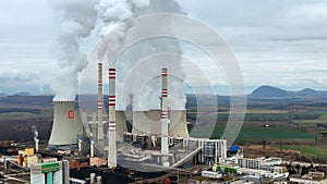 MOST, CZECH REPUBLIC, NOVEMBER 15, 2020: Power plant coal brown factory fired station Pocerady, chimney smokes stacks