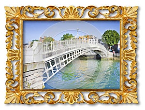 The most famous bridge in Dublin called Half penny bridge - concept image with an old wooden multicolored carved frame